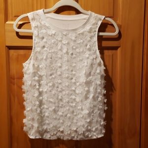 A New Day white sheer front tank with small floral applique